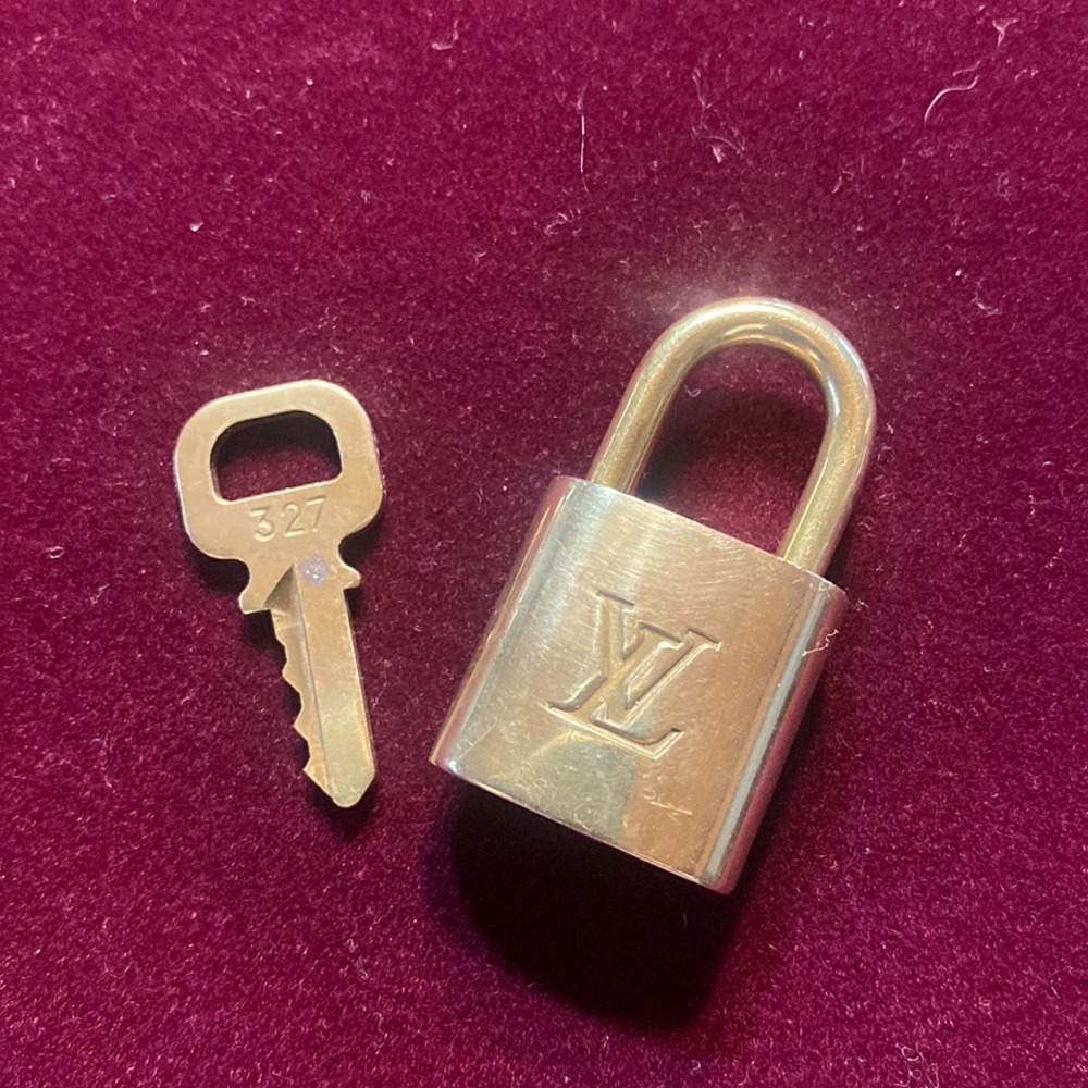 LOUIS VUITTON gold tone lock key set